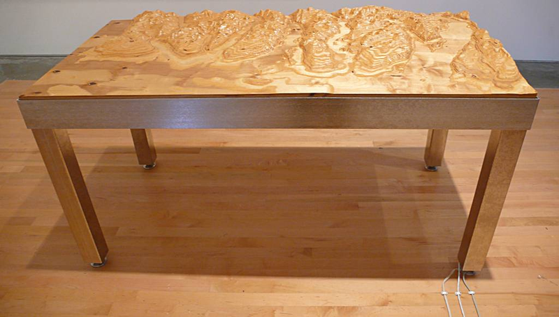 Illustration for article titled Topographic Tables Mix Geology With Interior Design